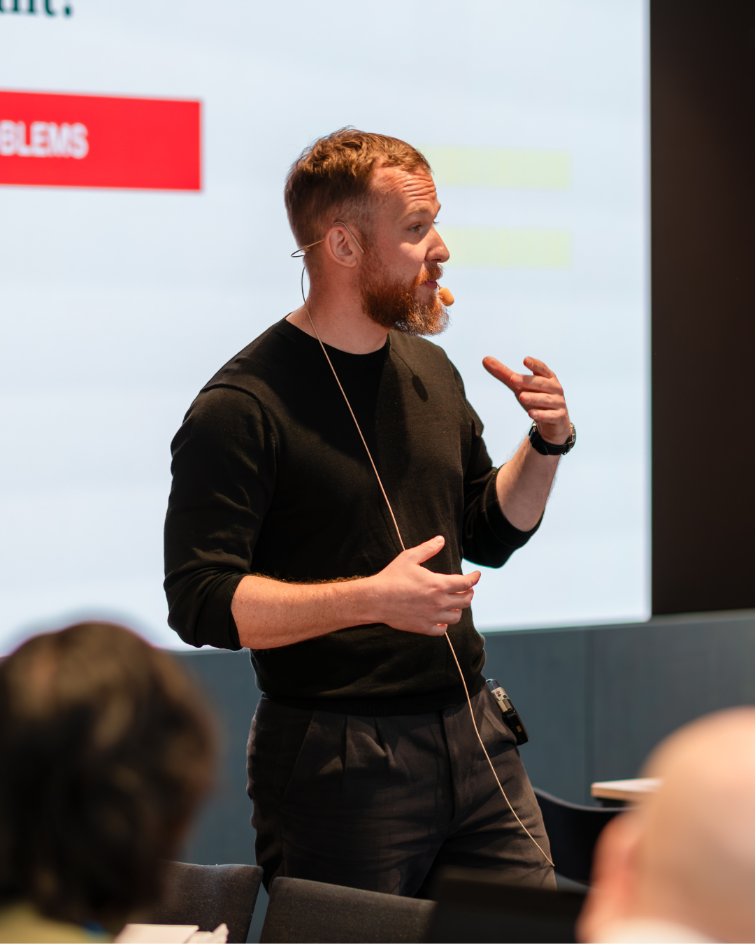Fredrik speaking at an event